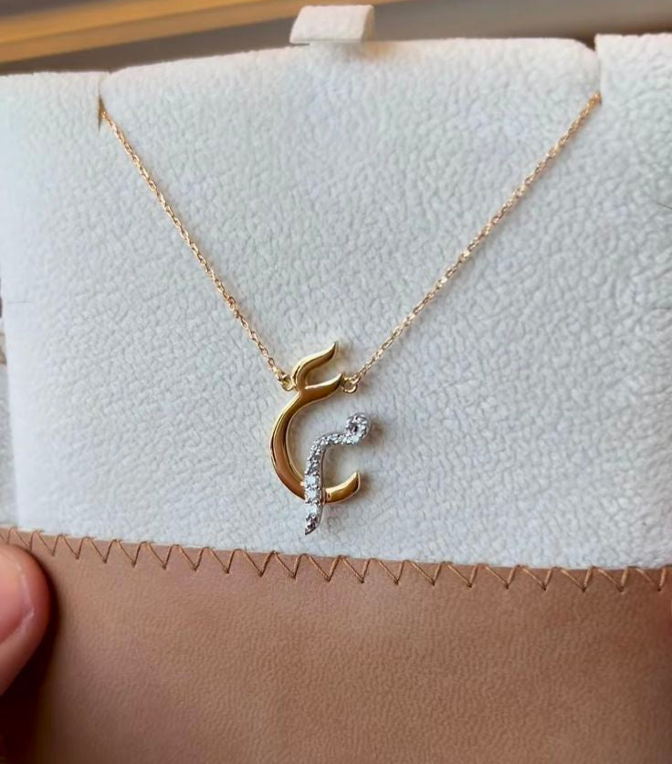 Arabic initial necklace.